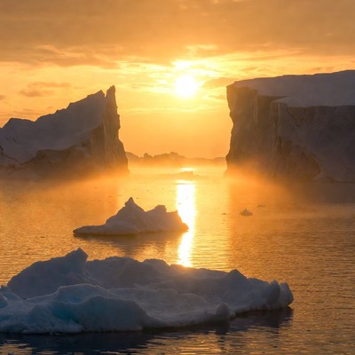 Sunrise Between Icebergs
