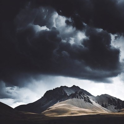 Dramatic Mountain Under Dark Storm Clouds