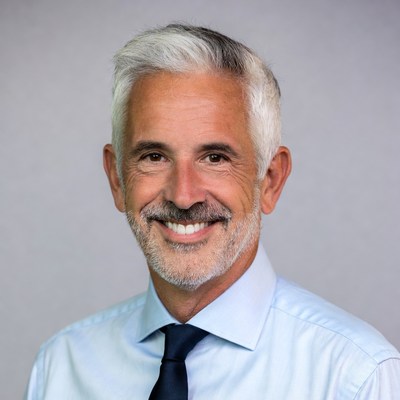 Smiling senior man in suit