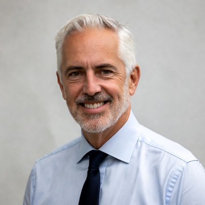 Smiling senior man in suit