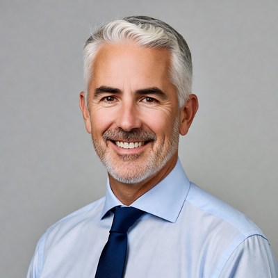 Smiling senior man in suit