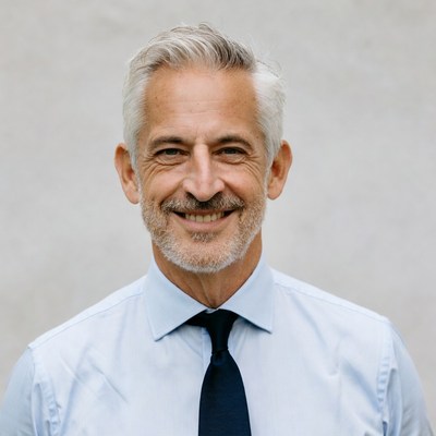Smiling senior man in suit