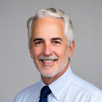 Smiling senior man in suit