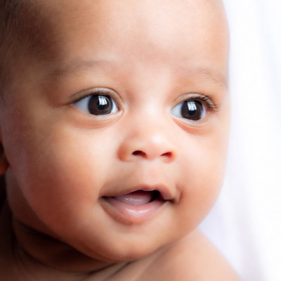 African-American baby smiling close-up
