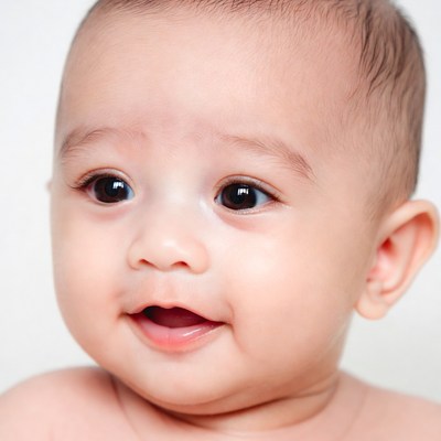 Asian baby smiling close-up