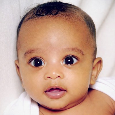 African-American baby with wide eyes