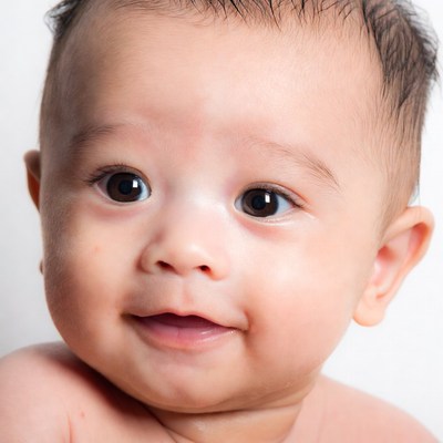 Asian baby smiling close-up