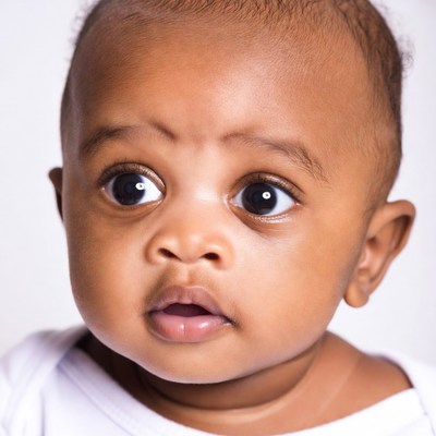 African-American baby with wide eyes