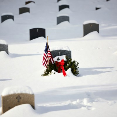 Snowy Grave with American Flag and Wreath