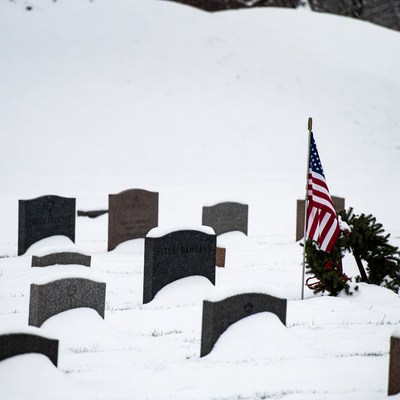 American Flag at Snowy Grave