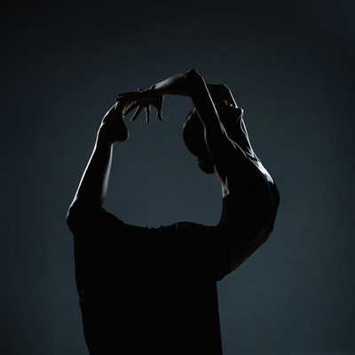 Silhouette of woman in yoga pose