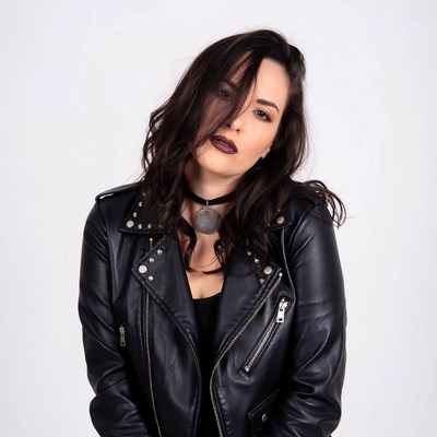 Woman in leather jacket with choker