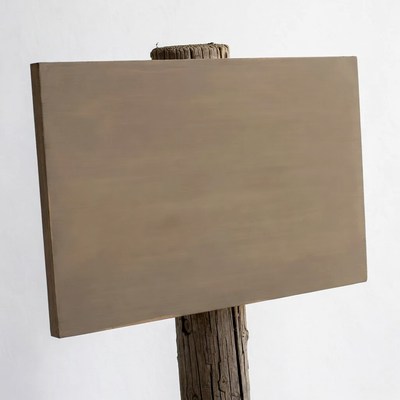 Blank wooden sign on post