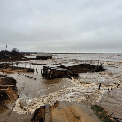 Flooded Wooden Houses in River
