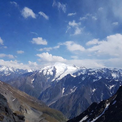 Snowy Mountains Under Blue Sky
