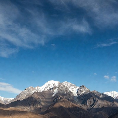 Snow-capped Mountains under Blue Sky