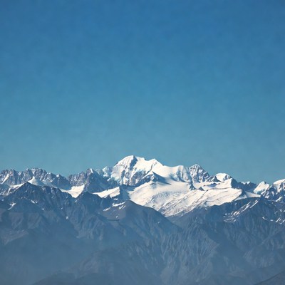 Snowy Mountain Peaks Blue Sky
