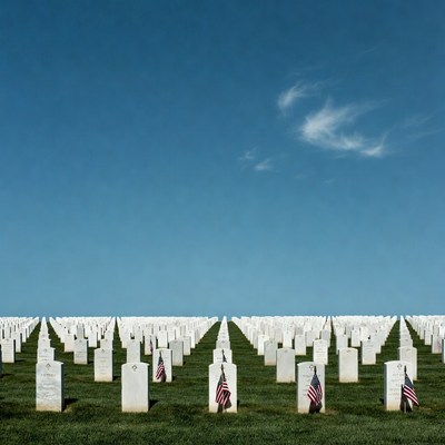 American flags on cemetery gravestones