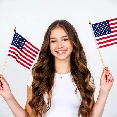 Girl holding American flags