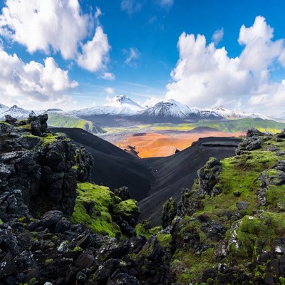 Volcanoes Over Colorful Valley Landscape