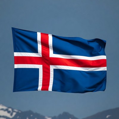 Icelandic Flag Waving Against Mountains