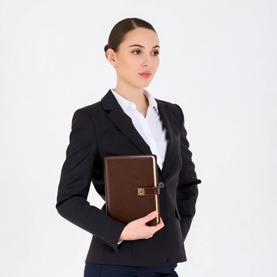 Business woman holding leather notebook