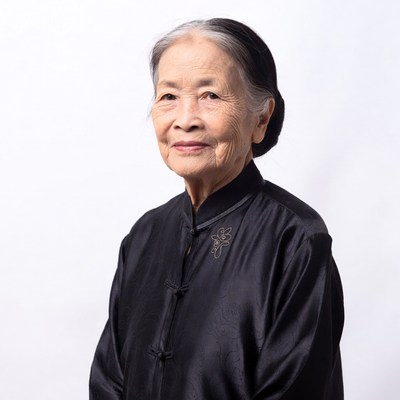 Elderly Asian woman in black qipao