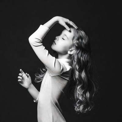 Girl posing with hand on head