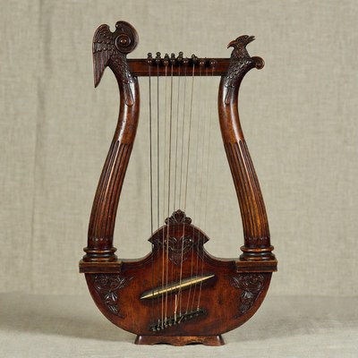 Ornate Wooden Lyre with Eagle Heads
