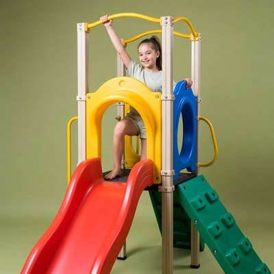Girl climbing colorful playground slide
