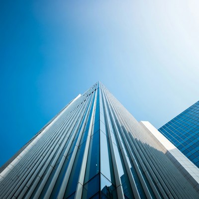 Tall Skyscraper Against Blue Sky