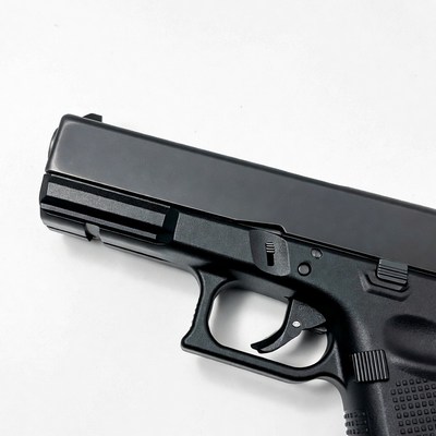 Black Glock Pistol on White Background