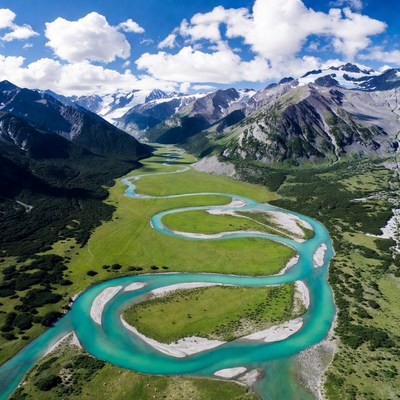 Turquoise River Winding Through Mountains