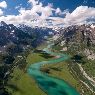 Turquoise River in Snowy Mountains