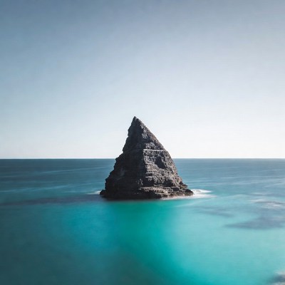 Triangular Rock Island in Ocean