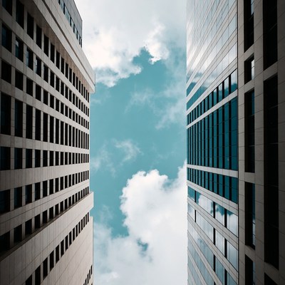 Tall Buildings Framing Blue Sky