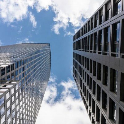 Tall skyscrapers under blue sky