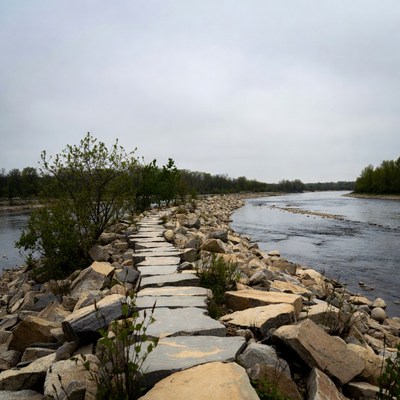 Stone Path Along River Riprap