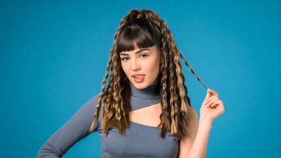 Woman with curly ponytail hairstyle