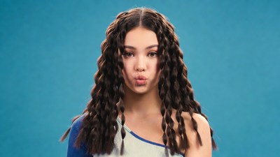 Young woman puckering lips