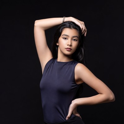 Asian woman posing on black background