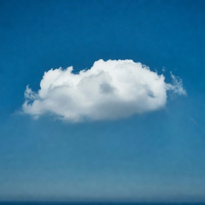 Fluffy white cloud in blue sky