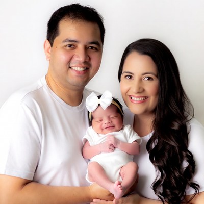 Happy Asian family with newborn baby