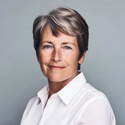 Smiling woman with short gray hair