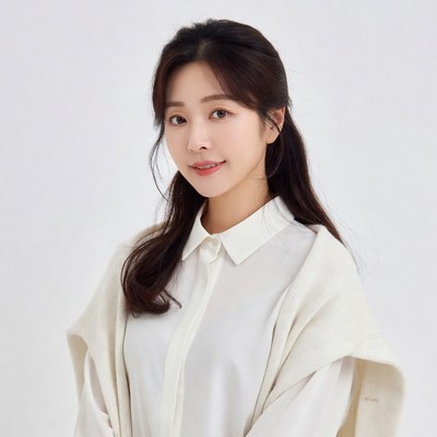 Asian woman in white shirt and cardigan