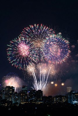 Colorful Fireworks over City Skyline