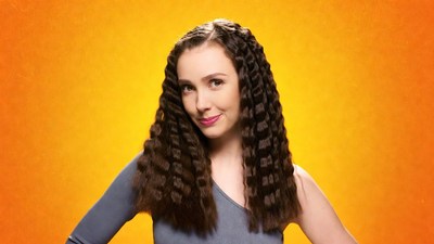 Woman with crimped hair smiling