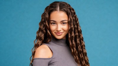 Smiling woman with curly hair