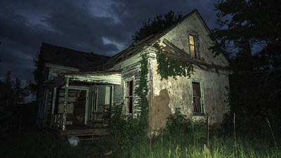 Abandoned haunted house at night