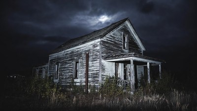 Abandoned haunted house at night